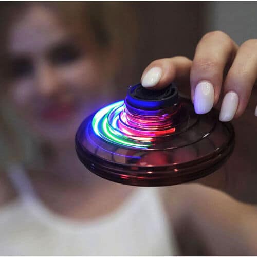 Mini drone with LED light: A small drone with a glowing LED light attached to it